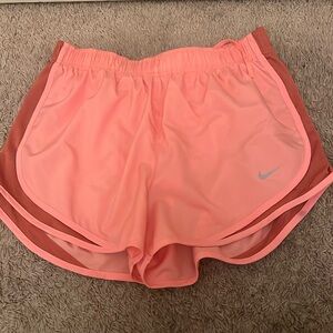 NEW WITH TAGS! Womens Pink Nike running shorts. Brand New!
